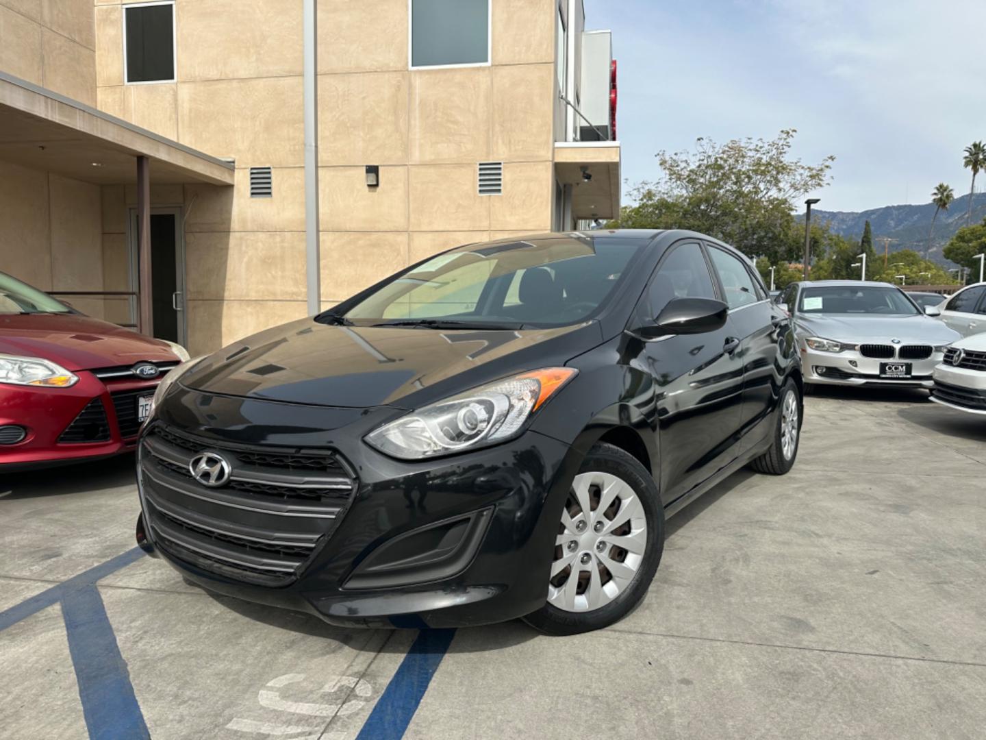 2016 Black Hyundai Elantra GT A/T (KMHD35LHXGU) with an 2.0L L4 16V DOHC engine, 6A transmission, located at 30 S. Berkeley Avenue, Pasadena, CA, 91107, (626) 248-7567, 34.145447, -118.109398 - Are you looking for a stylish and reliable used car, but have bad credit? Look no further than the 2016 Hyundai Elantra GT A/T! This popular car is available at our BHPH dealership in Pasadena, CA, and we offer bad credit auto loans to make it easy for you to get the car you need. The Elantra GT - Photo#0